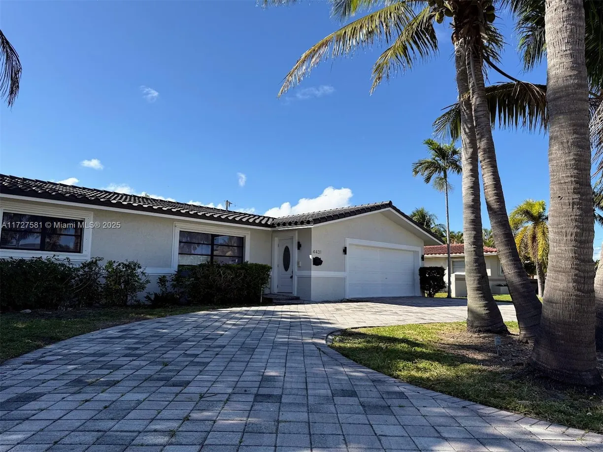 South Florida Real Estate | View 4431 NE 28th Ave | 4 Beds, 3 Baths