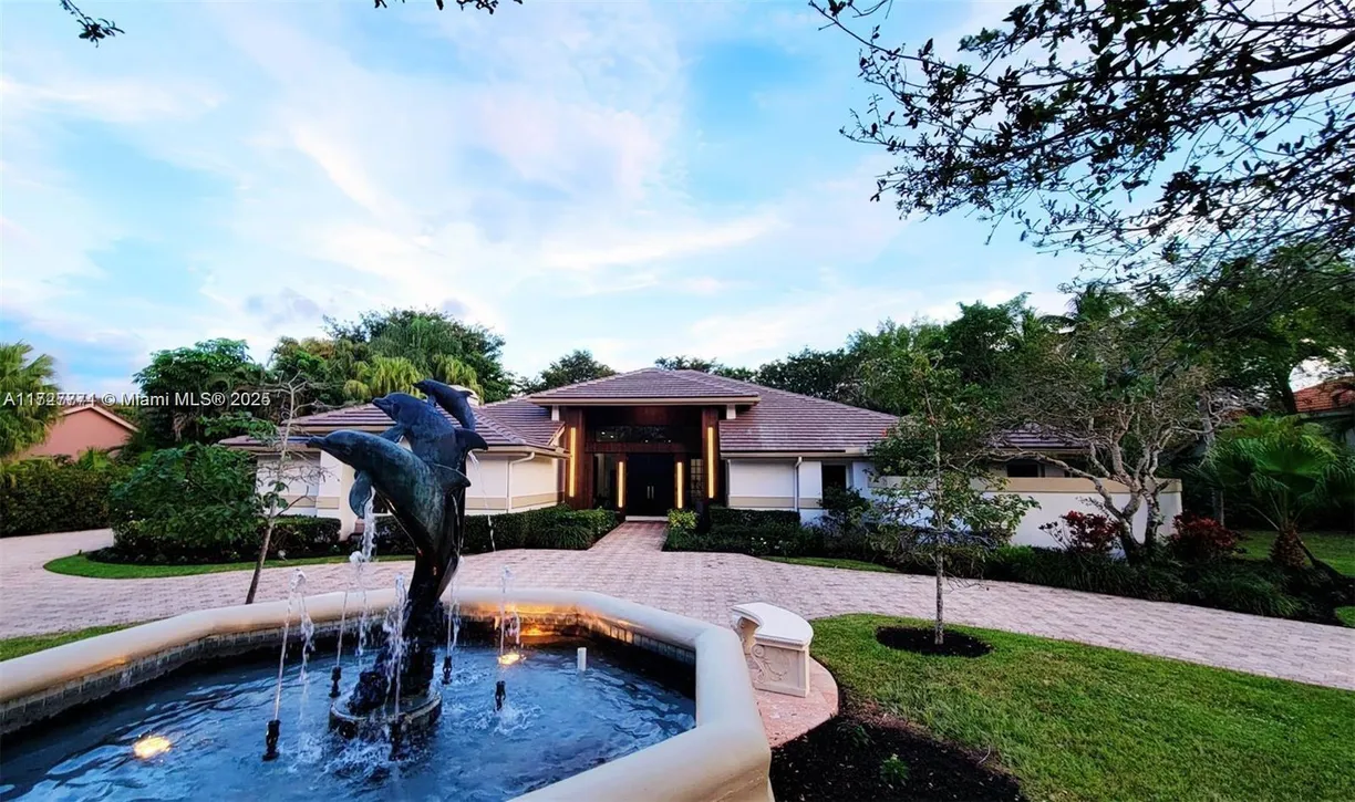 South Florida Real Estate | View 7700 S Woodridge Dr | 6 Beds, 7 Baths