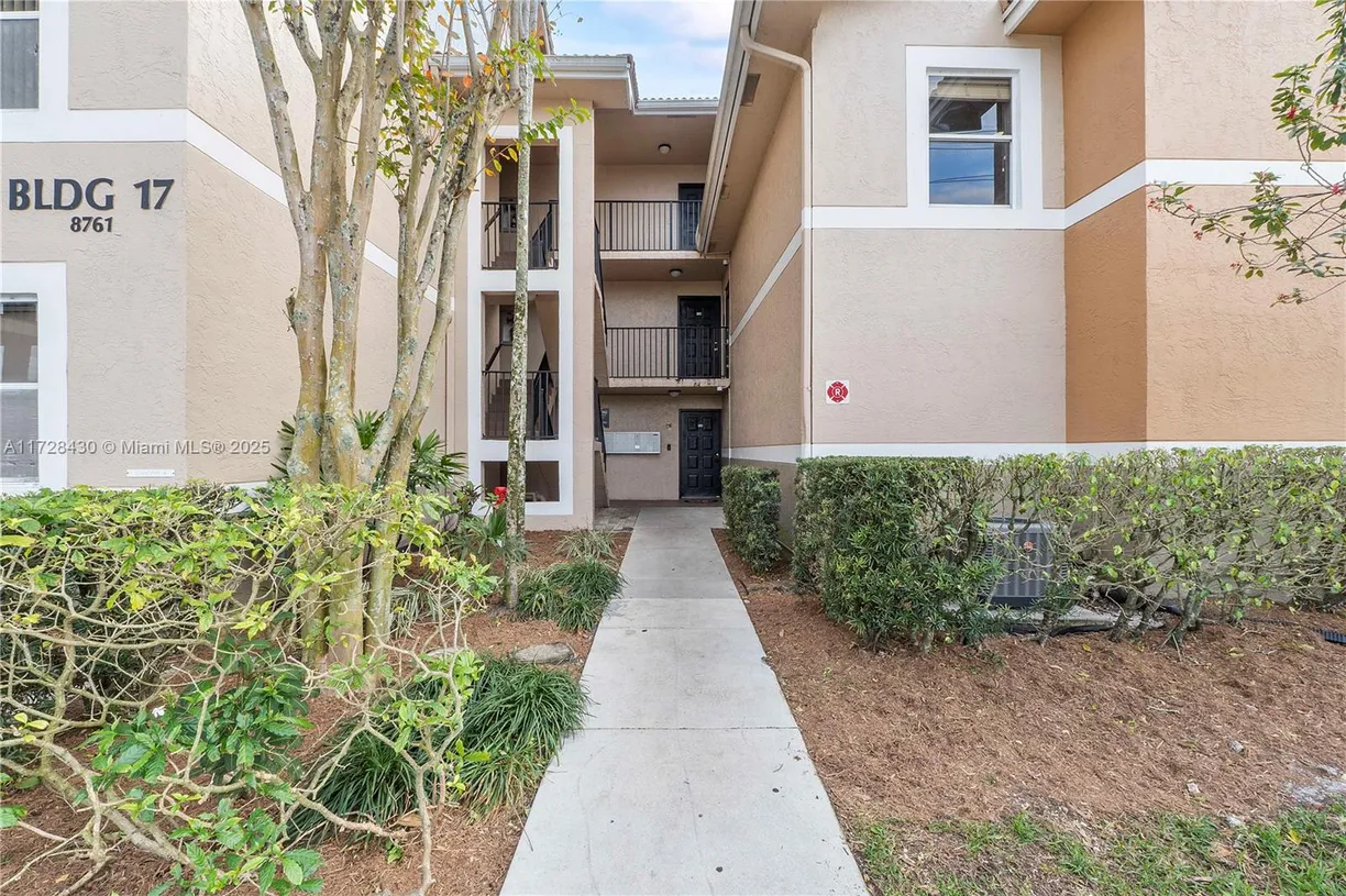 South Florida Real Estate | View 8761 Wiles Rd, 206 | 3 Beds, 2 Baths