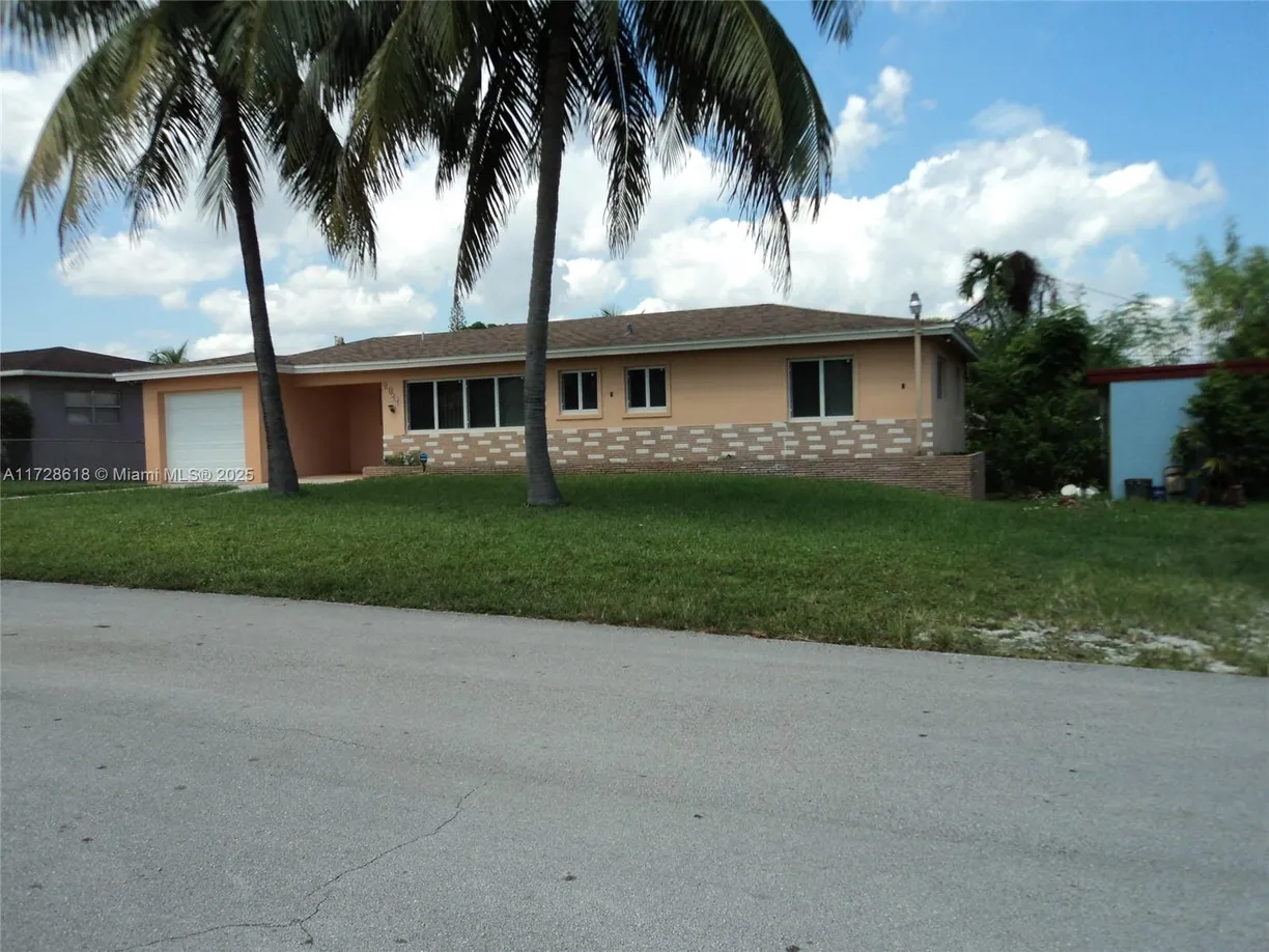 South Florida Real Estate | View 2611 Rodman St | 3 Beds, 2 Baths