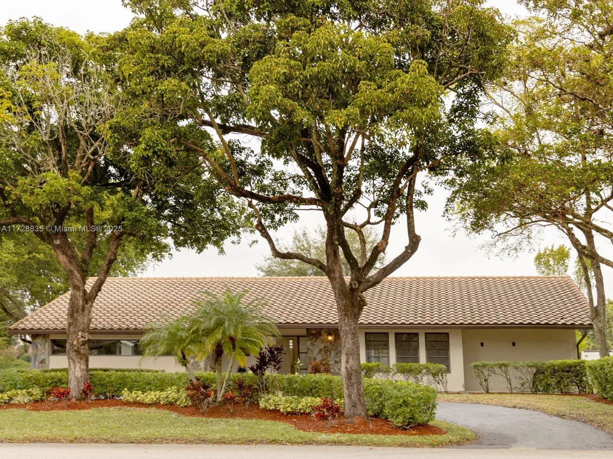 South Florida Real Estate | View 8491 Gatehouse Rd | 4 Beds, 3 Baths
