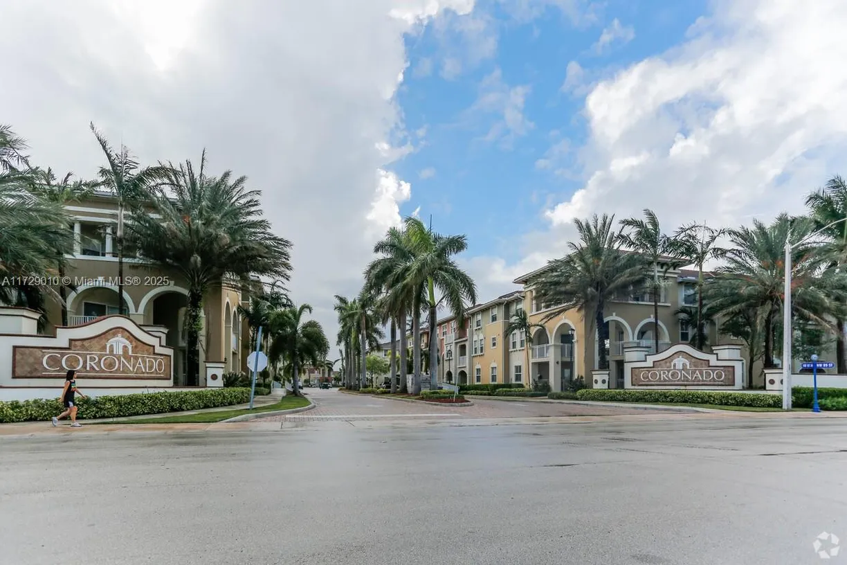 South Florida Real Estate | View 10805 NW 89th Ter, 202-4 | 2 Beds, 2 Baths
