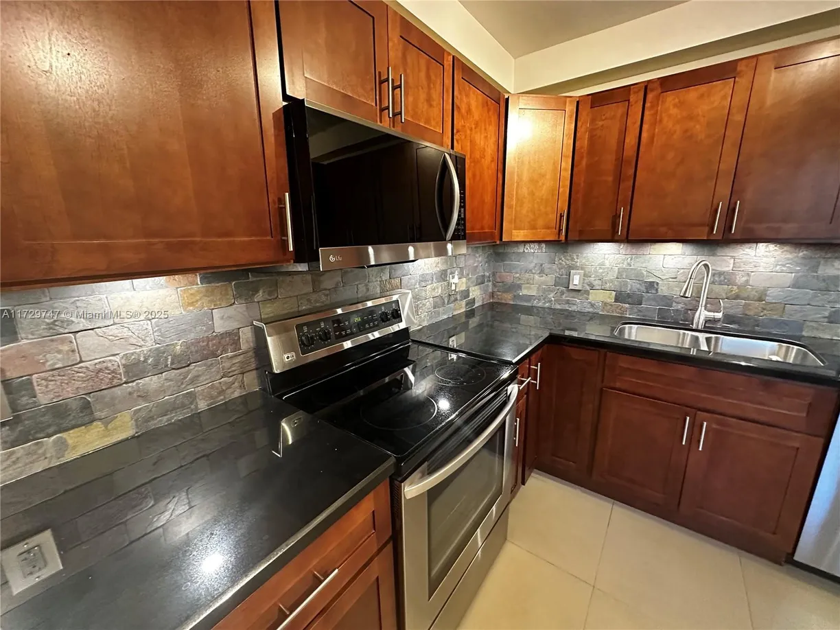South Florida Real Estate | View 3520 Oaks Way, 407 | 3 Beds, 2 Baths