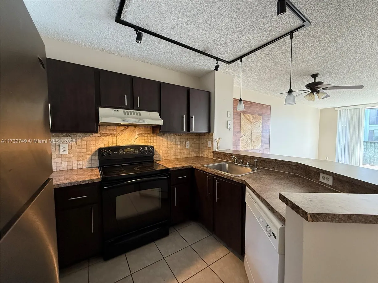 South Florida Real Estate | View 8750 N Sherman Cir, 302 | Listing