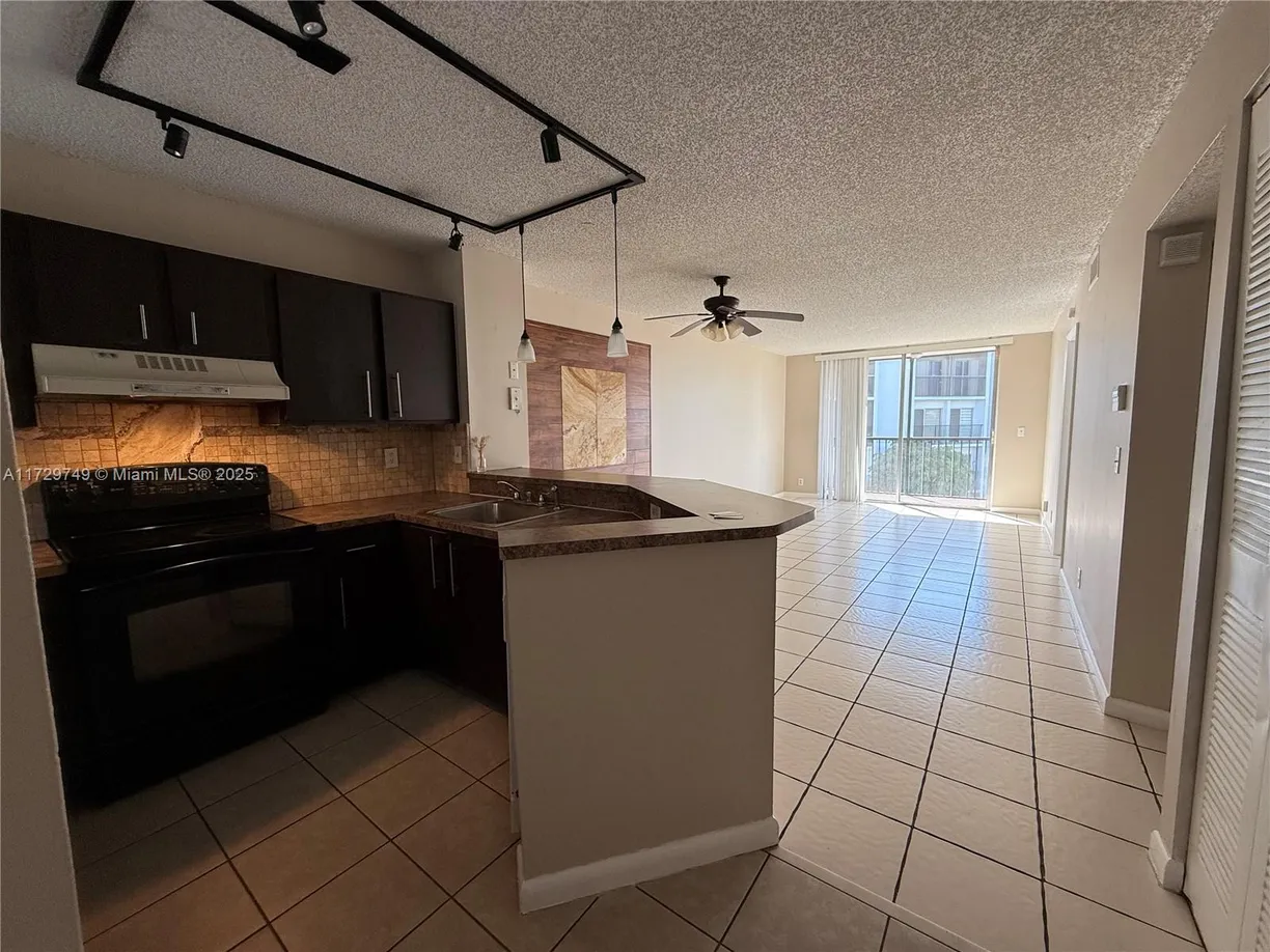 South Florida Real Estate | View 8750 N Sherman Cir, 302 | Listing