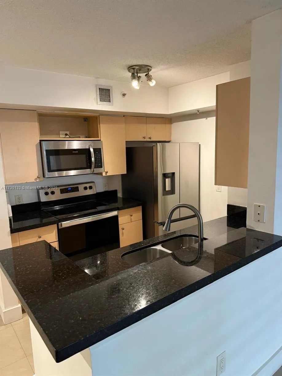 South Florida Real Estate | View 2433 Centergate Dr, 107 | 3 Beds, 2 Baths