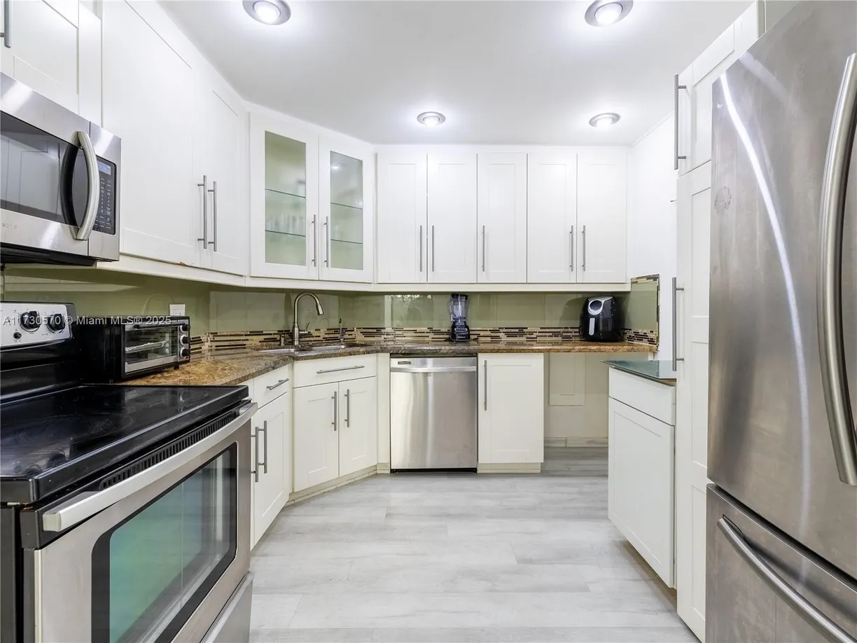 South Florida Real Estate | View 6300 S Falls Cir Dr, 207 | 3 Beds, 2 Baths