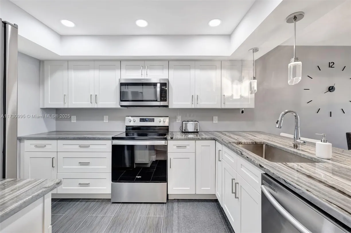 South Florida Real Estate | View 805 Cypress Blvd, 301 | 3 Beds, 2 Baths