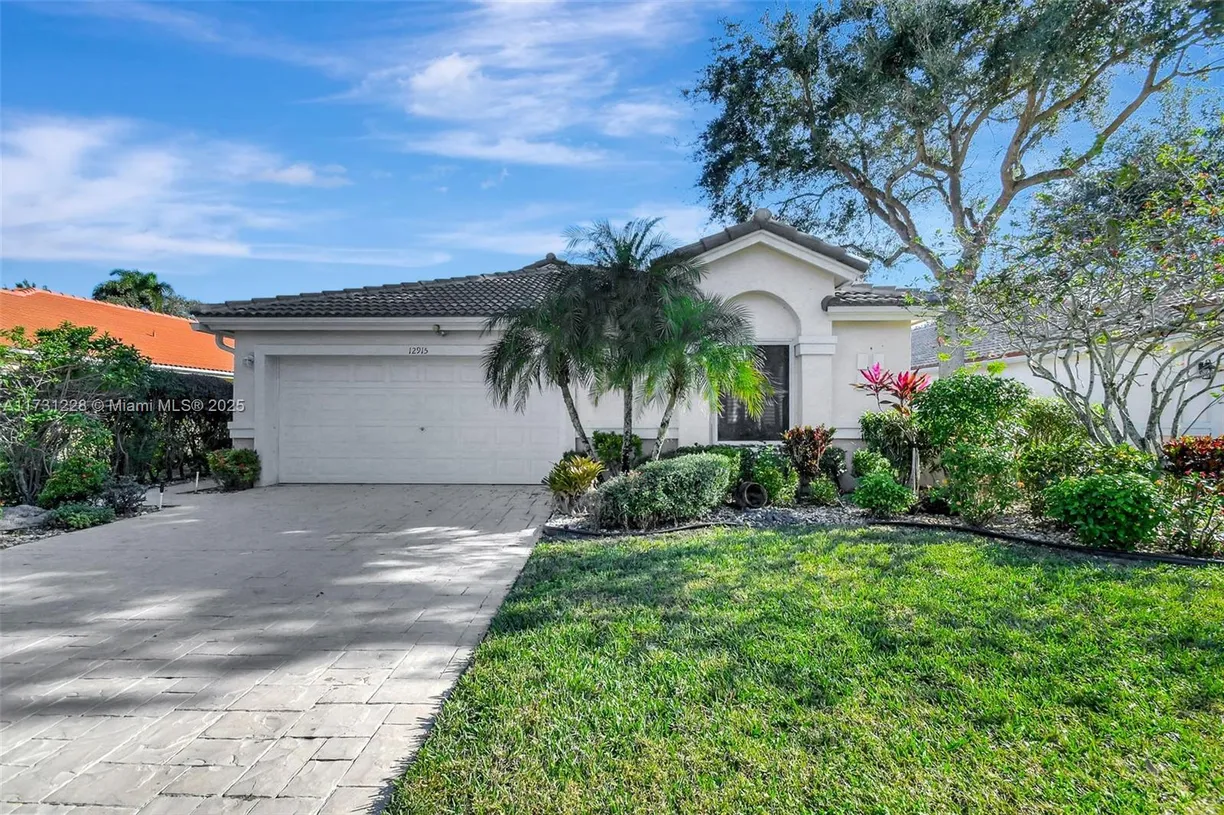 South Florida Real Estate | View 12915 Coral Lakes Dr | 3 Beds, 2 Baths
