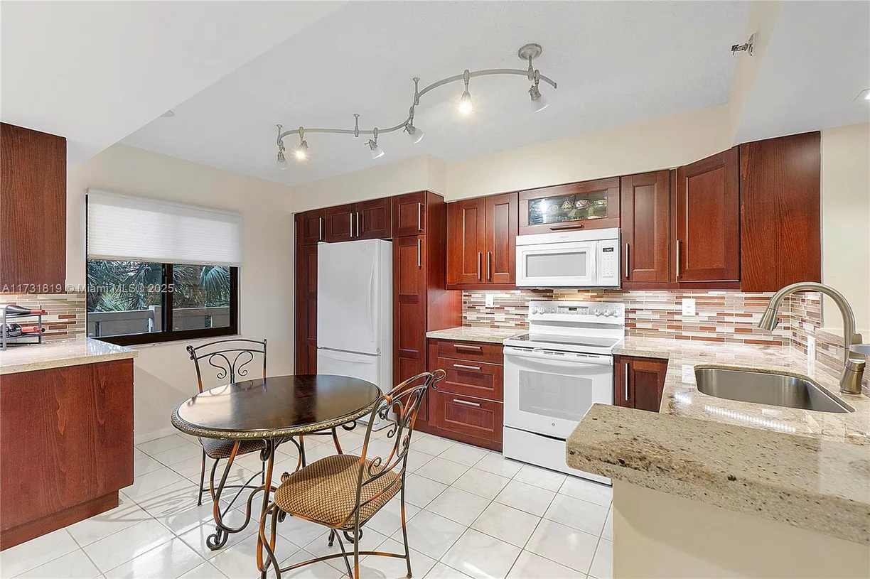 South Florida Real Estate | View 2200 S Cypress Bend Dr, 406 | Listing