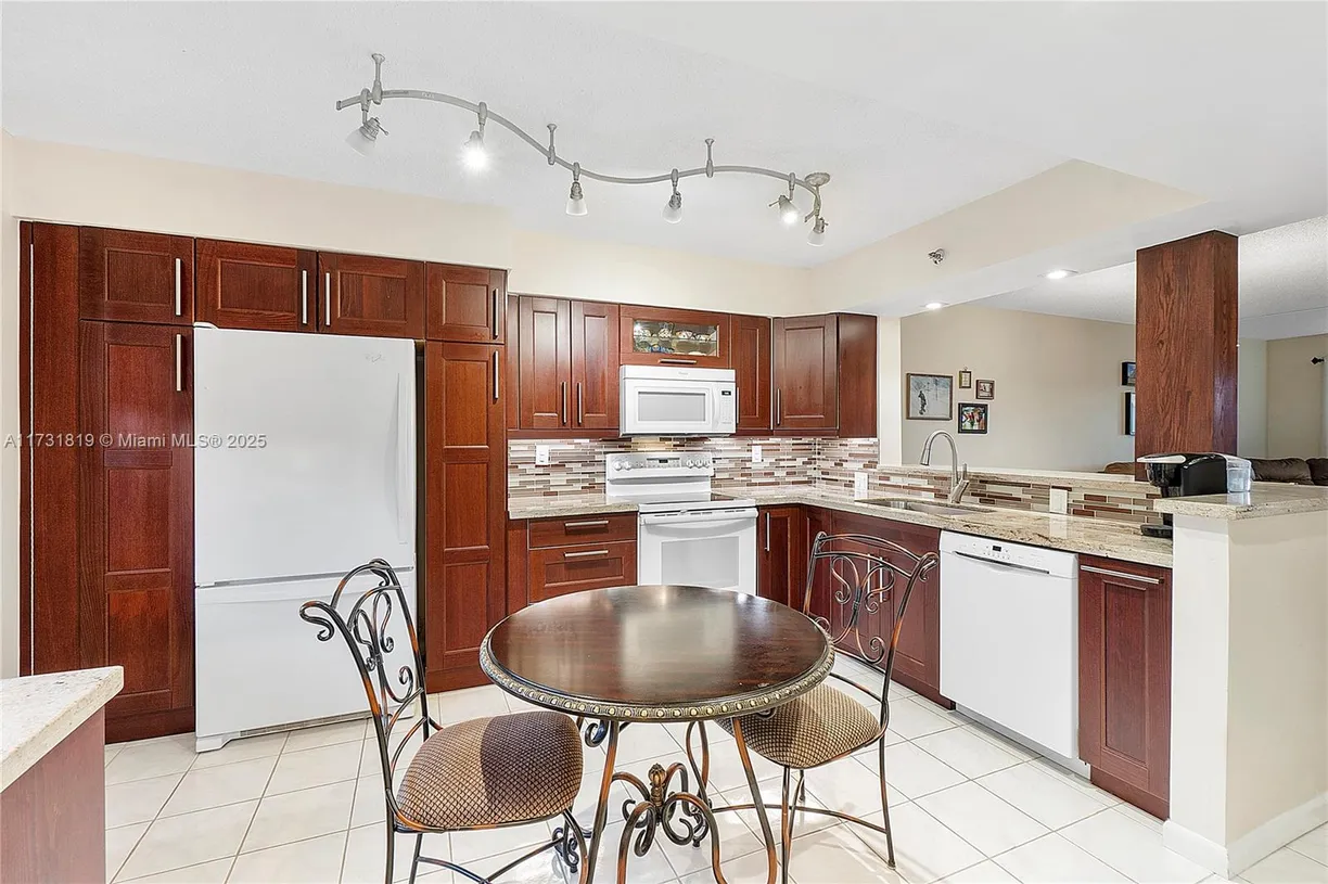 South Florida Real Estate | View 2200 S Cypress Bend Dr, 406 | 2 Beds, 2 Baths