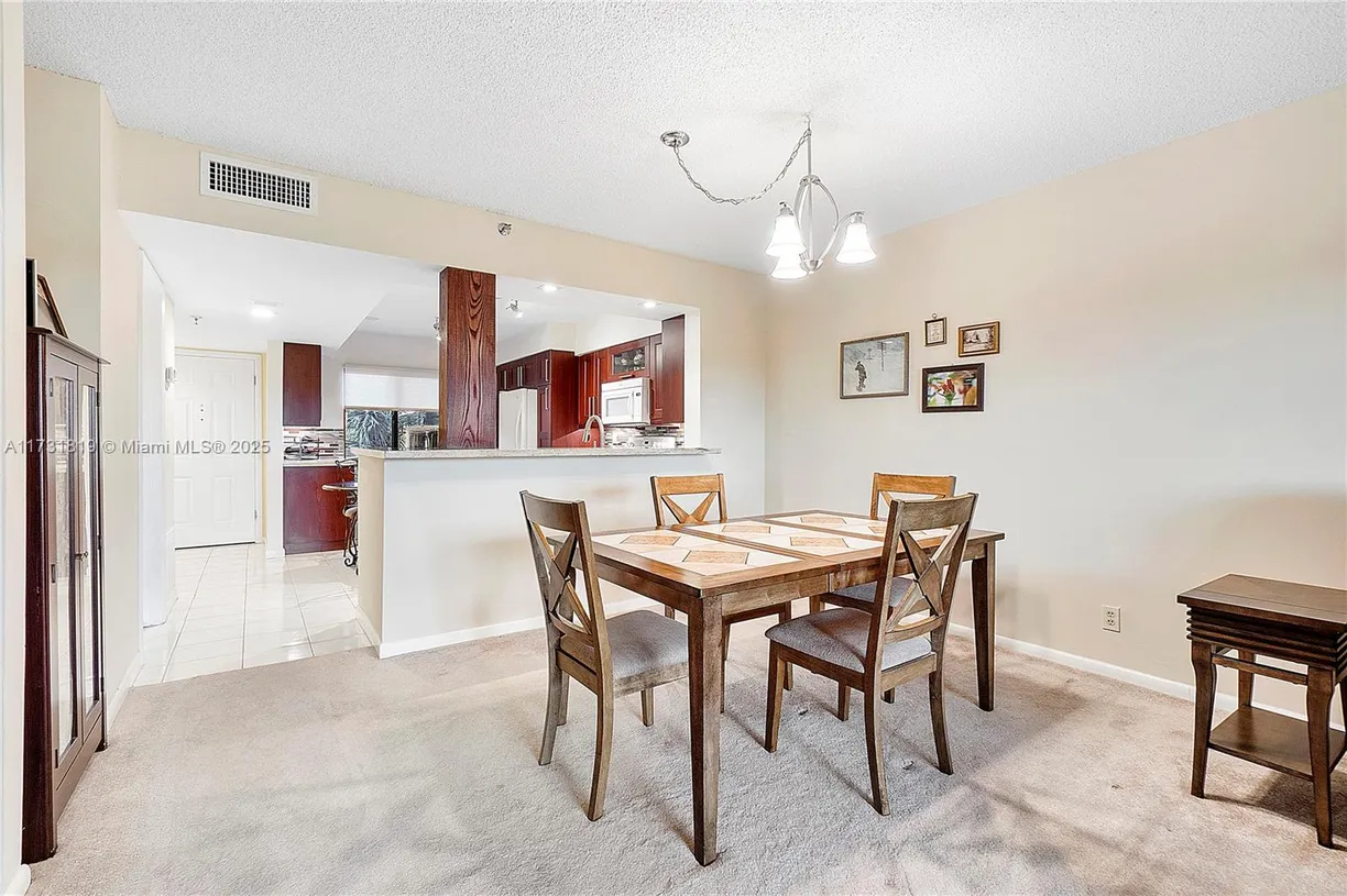 South Florida Real Estate | View 2200 S Cypress Bend Dr, 406 | Listing