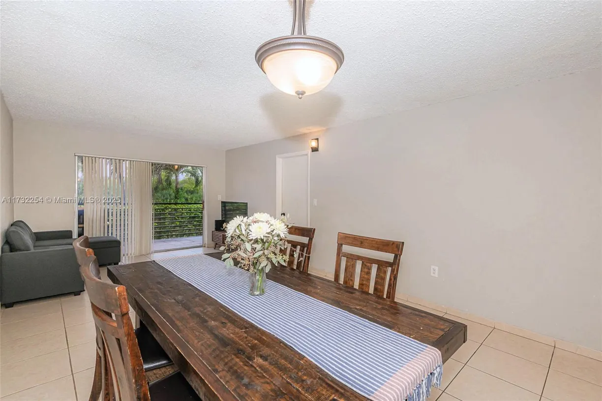 South Florida Real Estate | View 3110 N Pine Island Rd, 210 | 2 Beds, 2 Baths