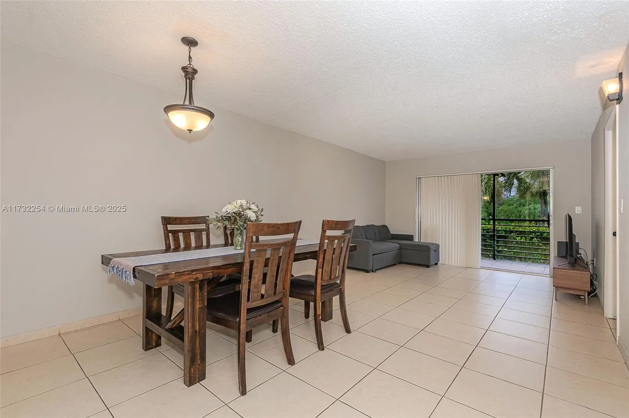 South Florida Real Estate | View 3110 N Pine Island Rd, 210 | Listing
