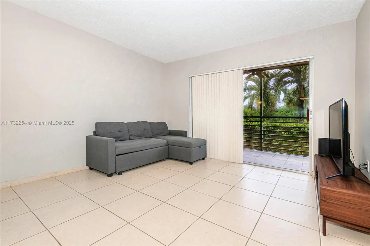 South Florida Real Estate | View 3110 N Pine Island Rd, 210 | Listing