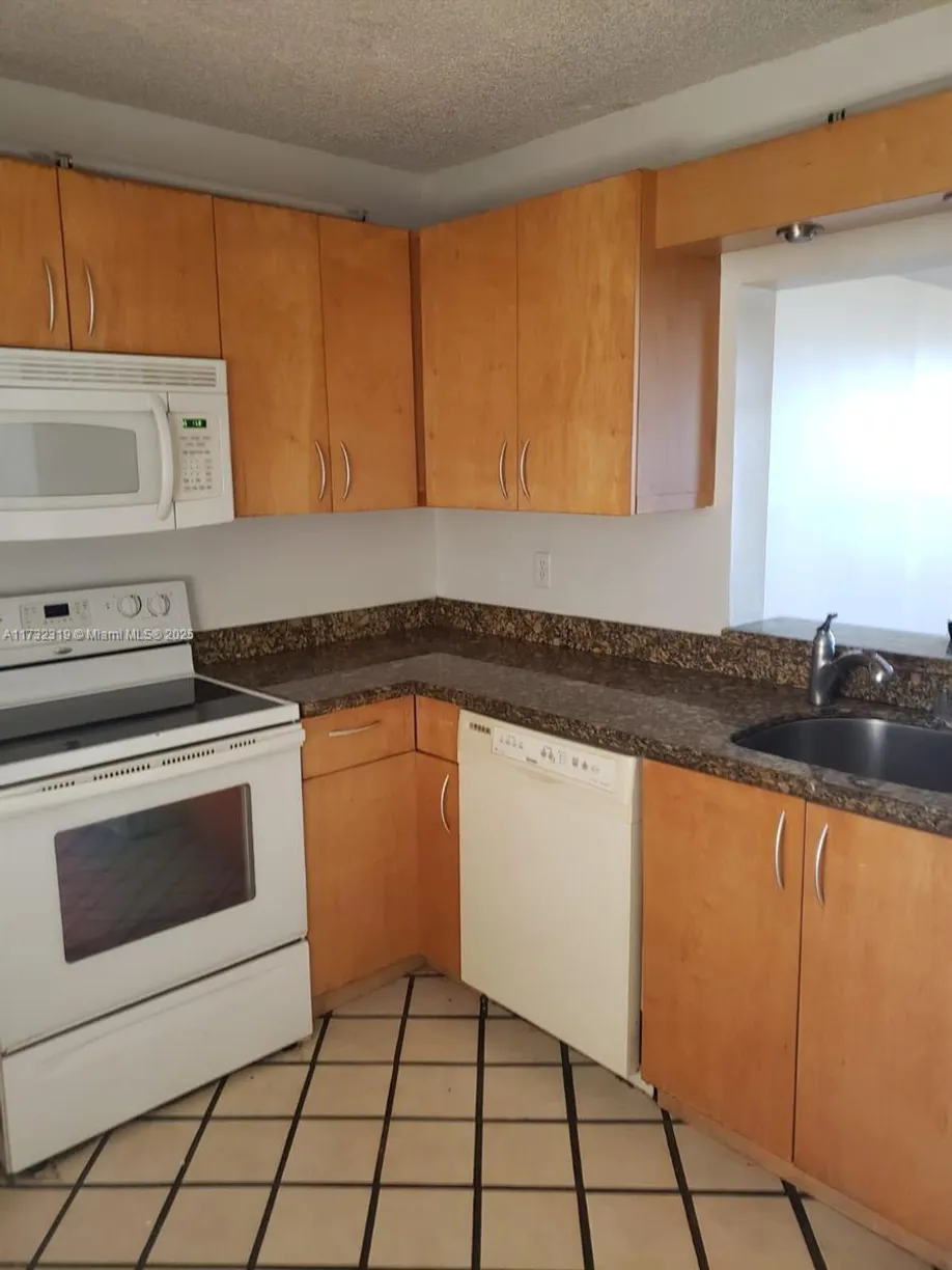 South Florida Real Estate | View 2830 Somerset Dr, 415N | 2 Beds, 2 Baths