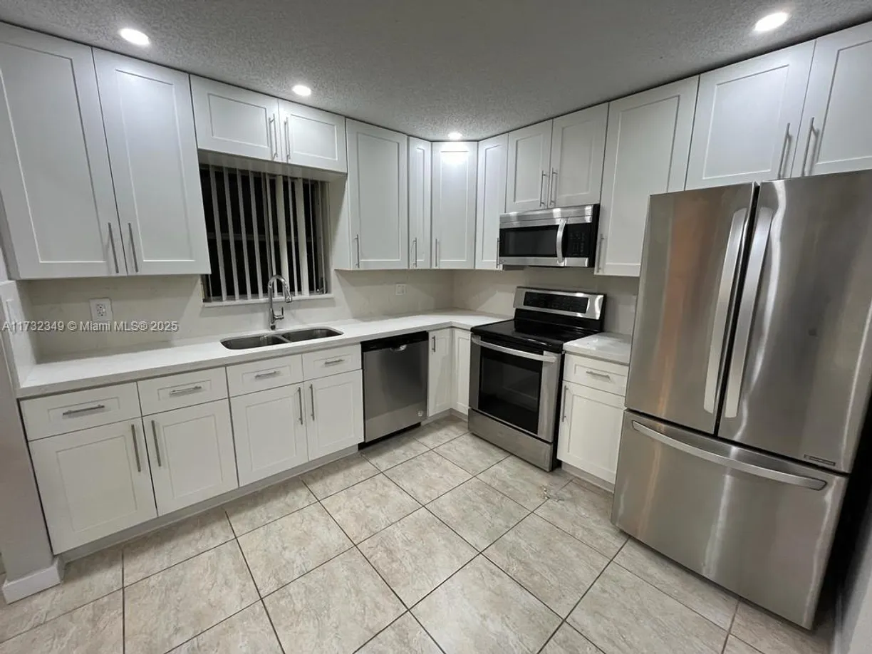 South Florida Real Estate | View 3328 Simms St | 3 Beds, 2 Baths