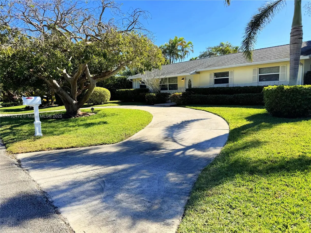 South Florida Real Estate | View 2448 Holly Ln | 5 Beds, 3 Baths