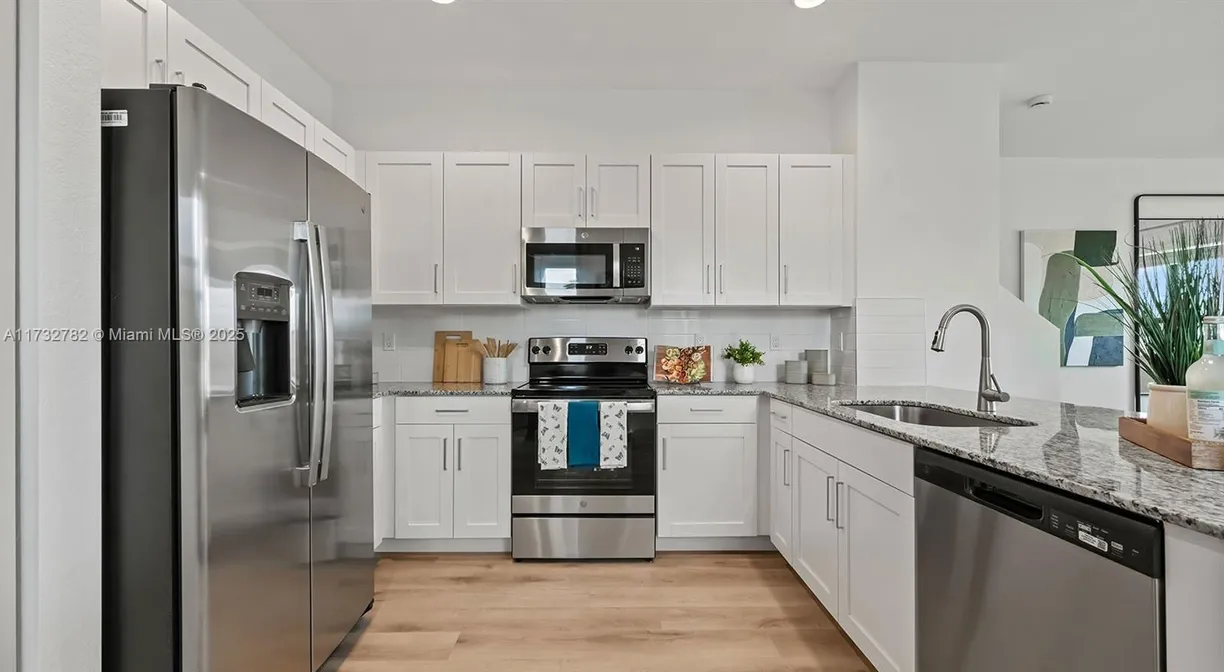 South Florida Real Estate | View 5600 NW Coventry Circle, 3Br | Listing