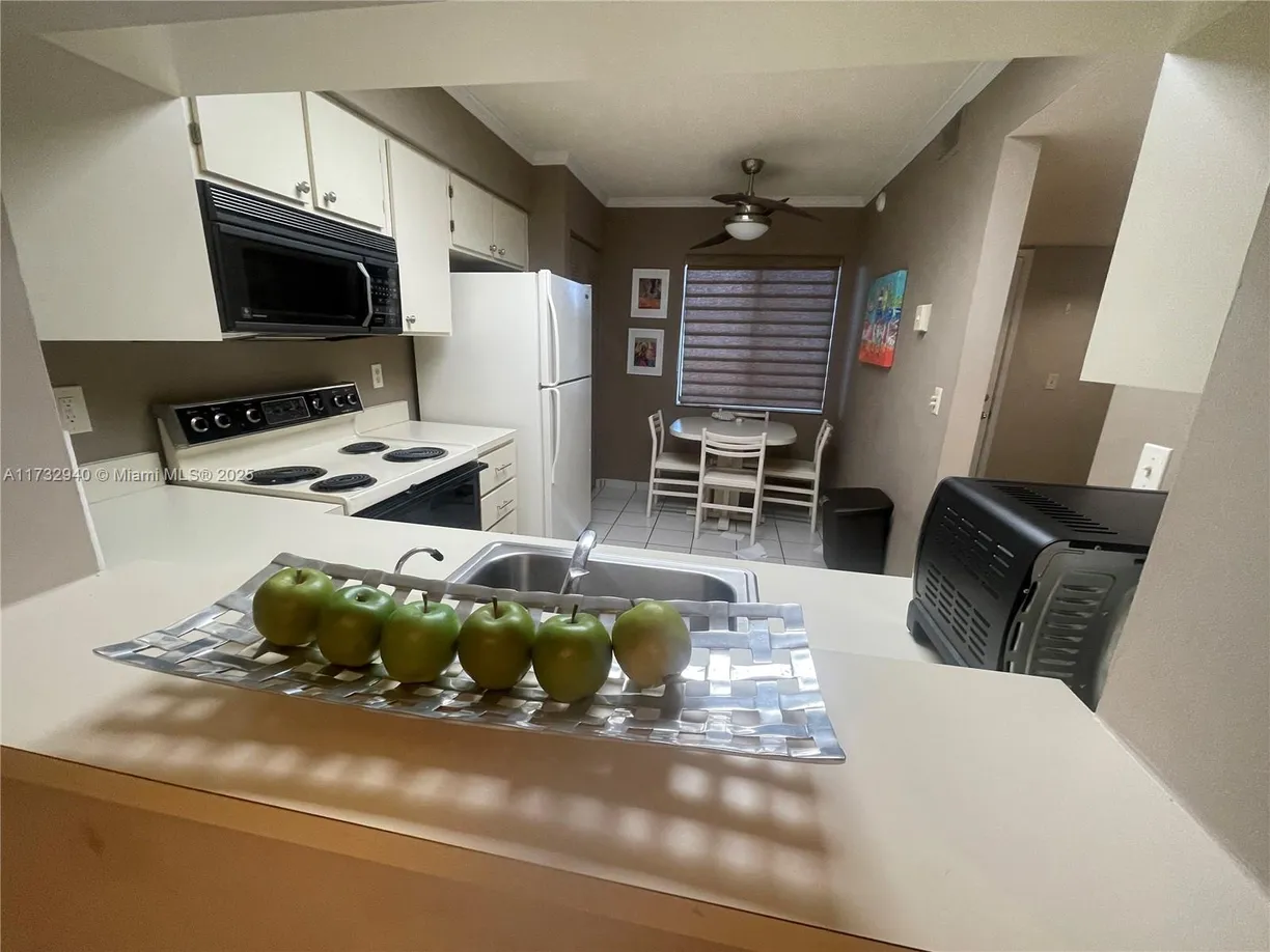 South Florida Real Estate | View 7300 Amberly Ln, 403 | 2 Beds, 2 Baths