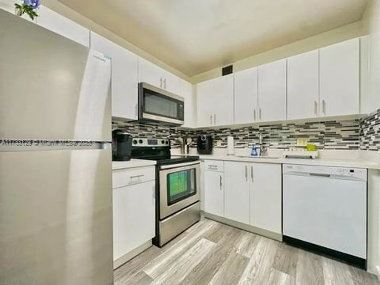 South Florida Real Estate | View 150 SW 134th Way, 203R | 2 Beds, 1 Bath
