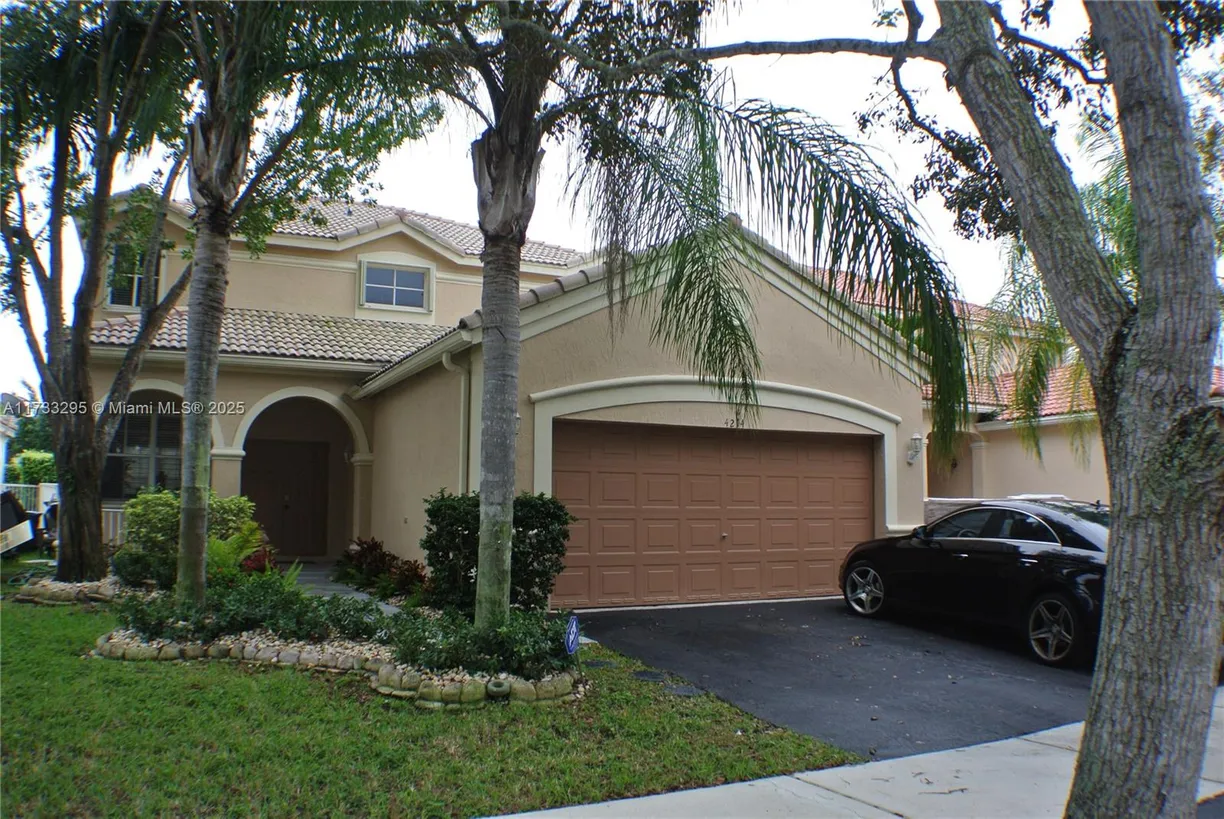 South Florida Real Estate | View 4214 Sabal Ridge Cir | 4 Beds, 2 Baths