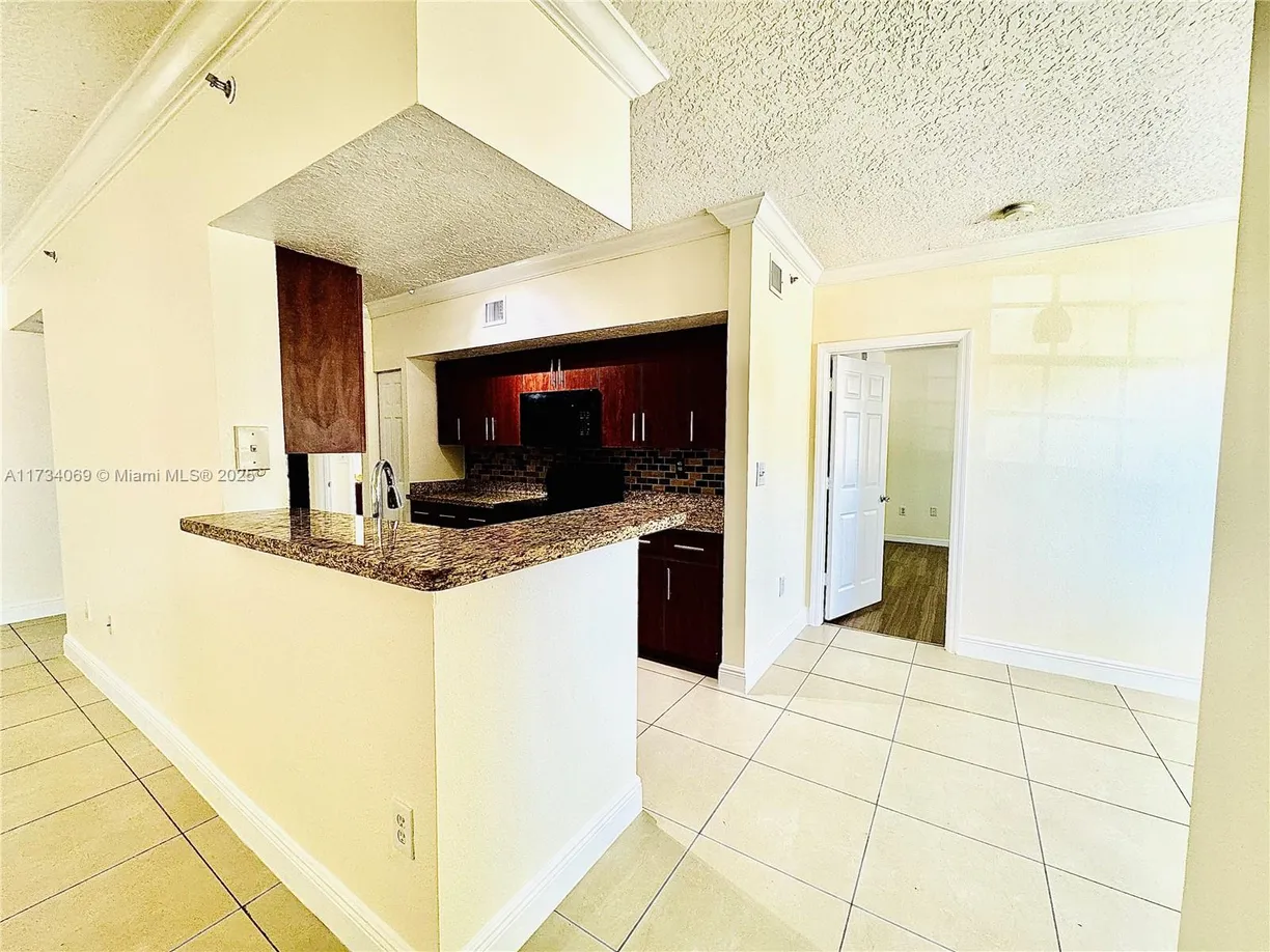 South Florida Real Estate | View 220 SW 116th Ave, 15207 | 2 Beds, 2 Baths
