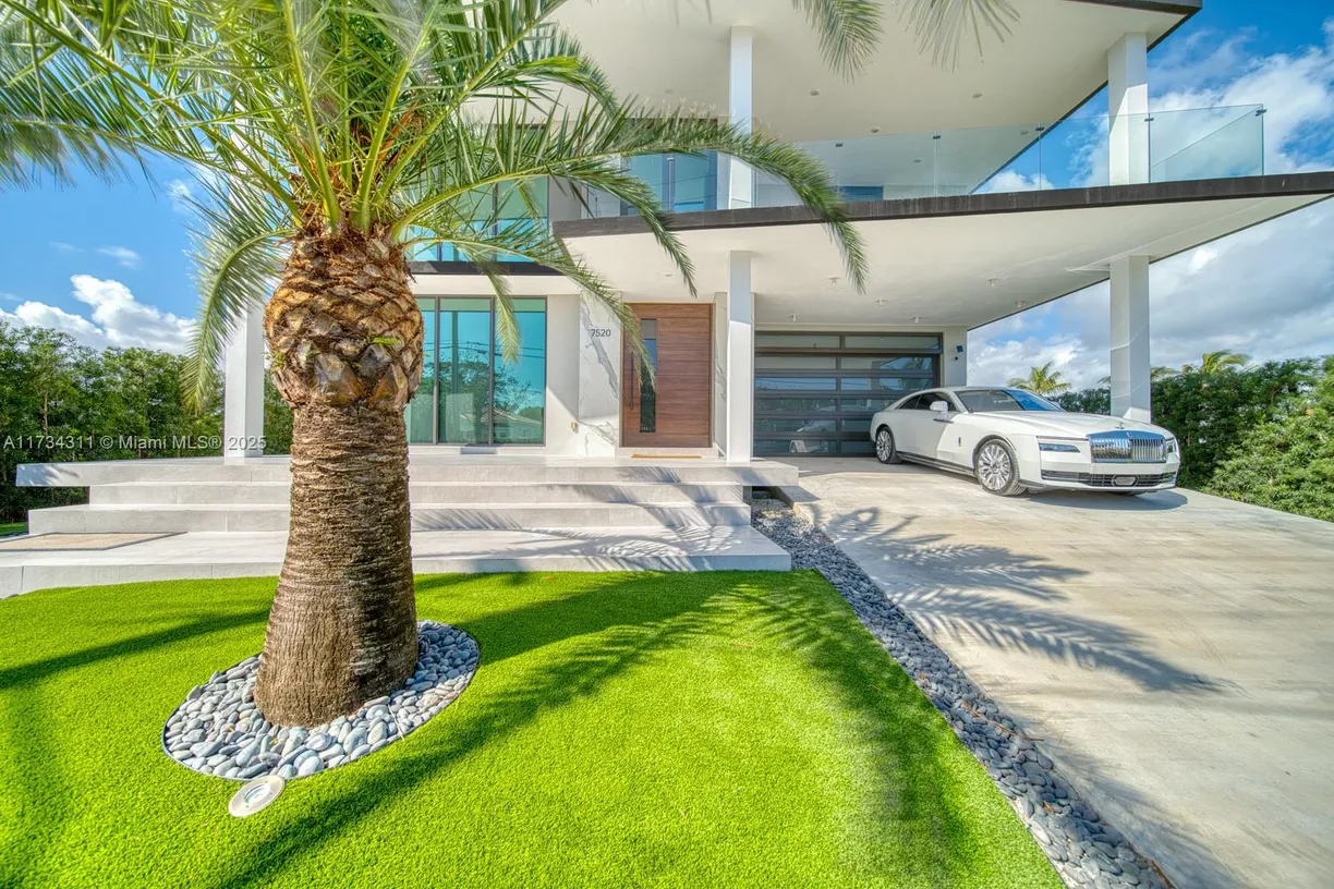 South Florida Real Estate | View 7520 W Treasure Dr | Listing