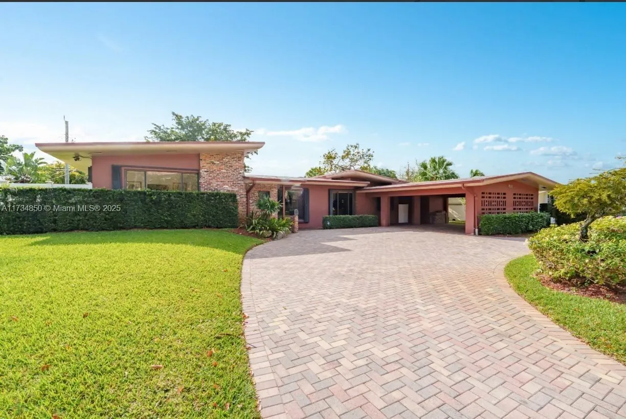 South Florida Real Estate | View 811 N Highland Dr | 4 Beds, 2 Baths