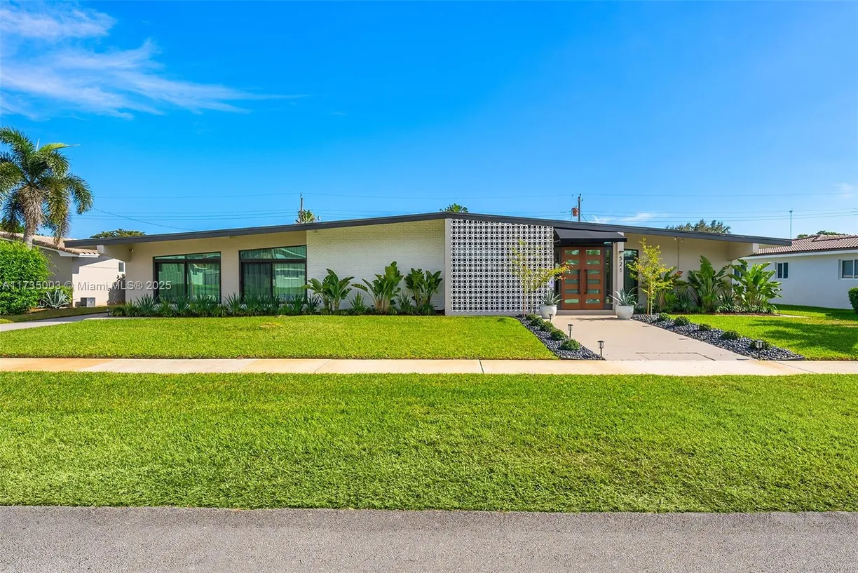South Florida Real Estate | View 521 N Highland Dr | 5 Beds, 4 Baths