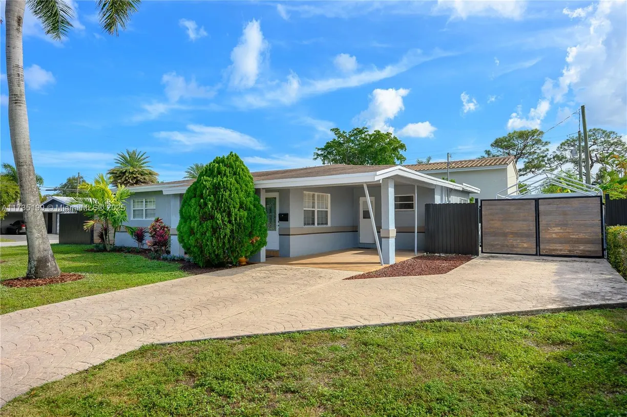 South Florida Real Estate | View 1498 NE 39th St | 4 Beds, 3 Baths