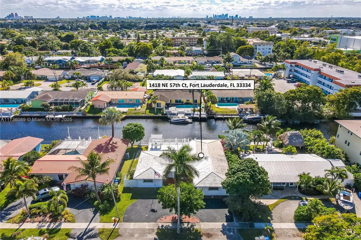 South Florida Real Estate | View 1418 NE 57th Ct | 5 Beds, 3 Baths
