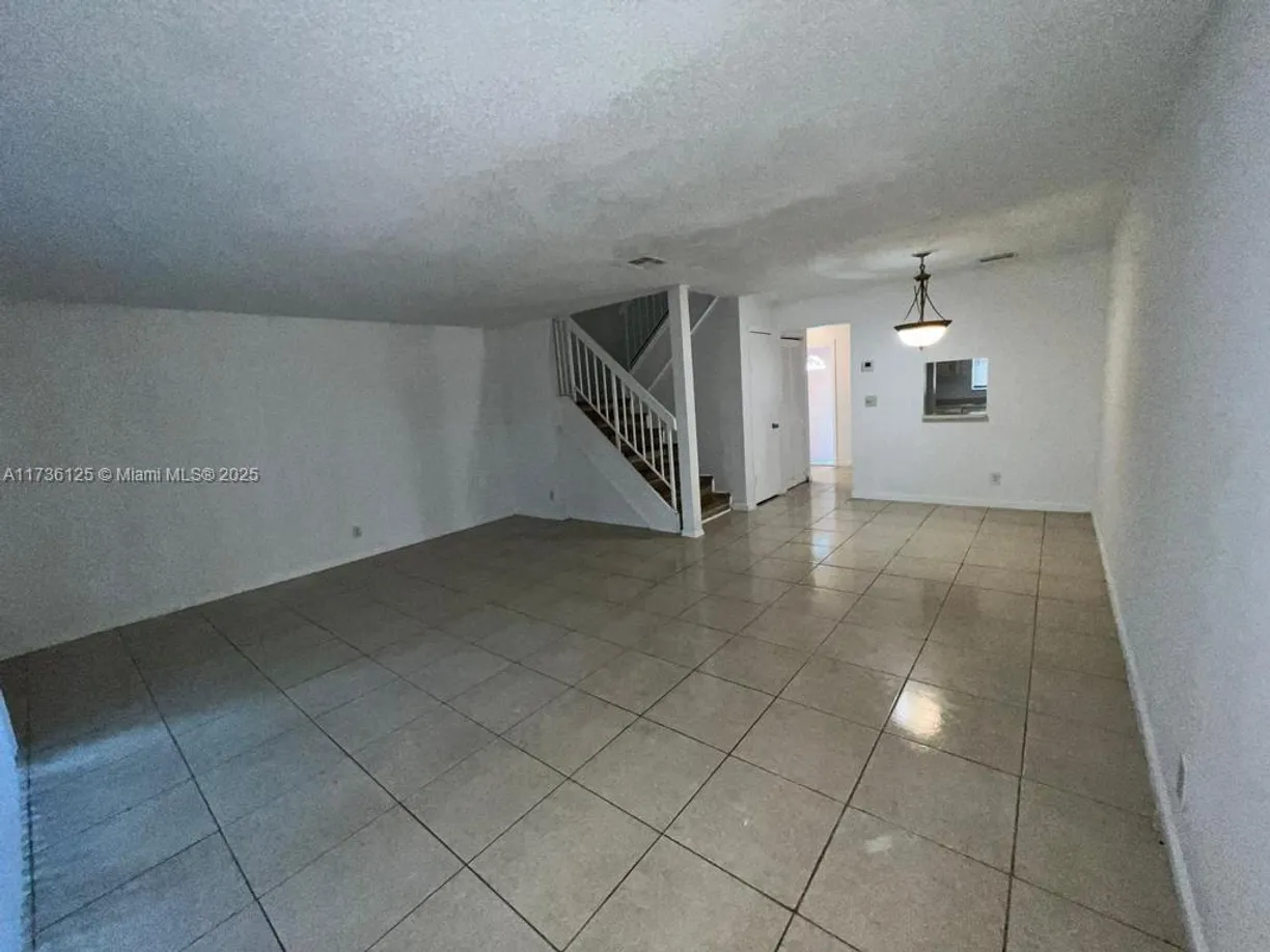 South Florida Real Estate | View 7903 SW 8th St | 3 Beds, 2 Baths