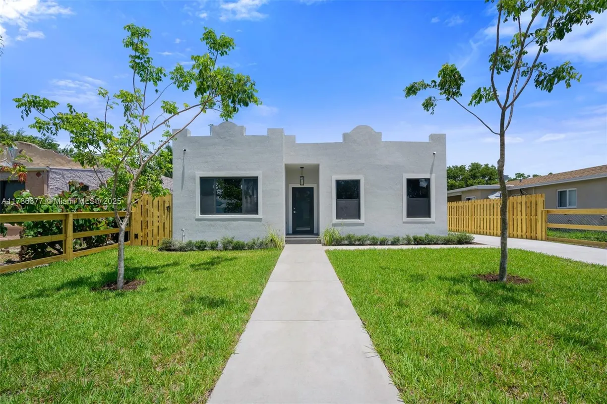 South Florida Real Estate | View 619 35th St | 4 Beds, 3 Baths