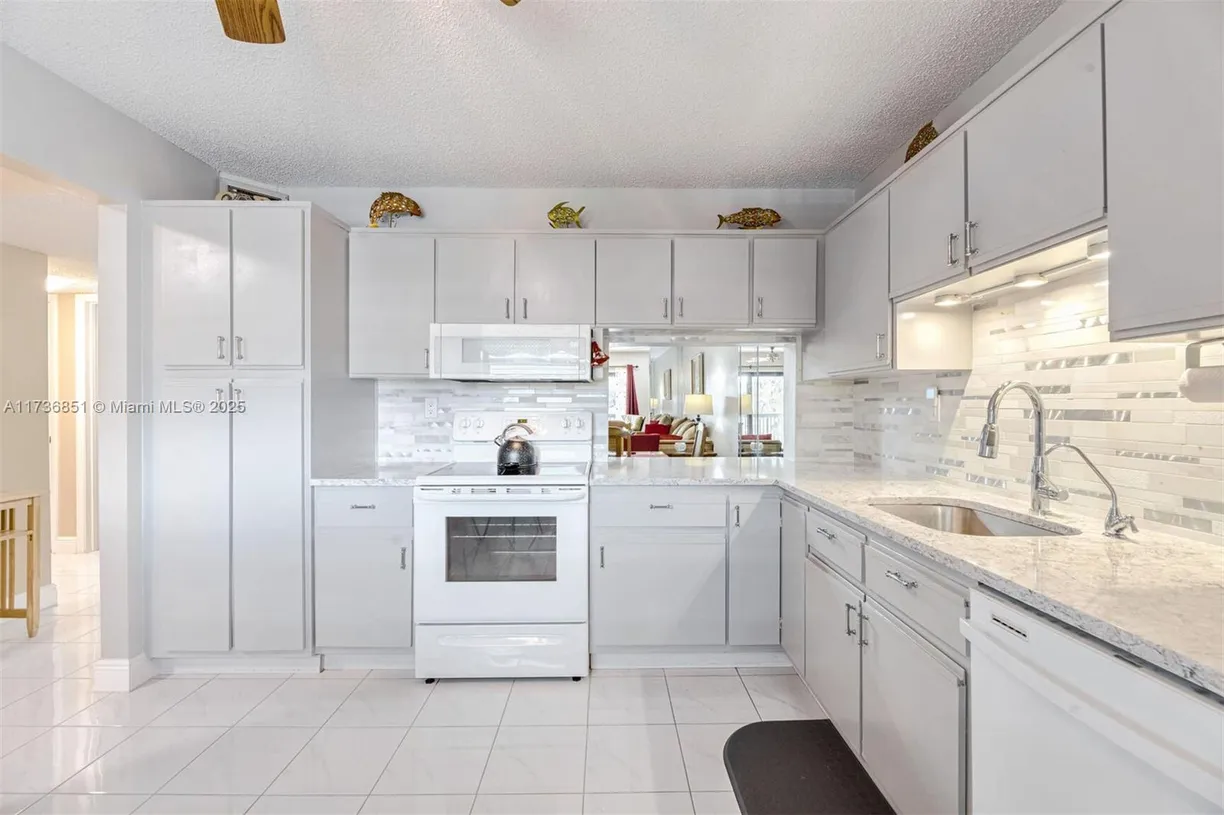 South Florida Real Estate | View 4955 E Sabal Palm Blvd, 305 | 2 Beds, 2 Baths