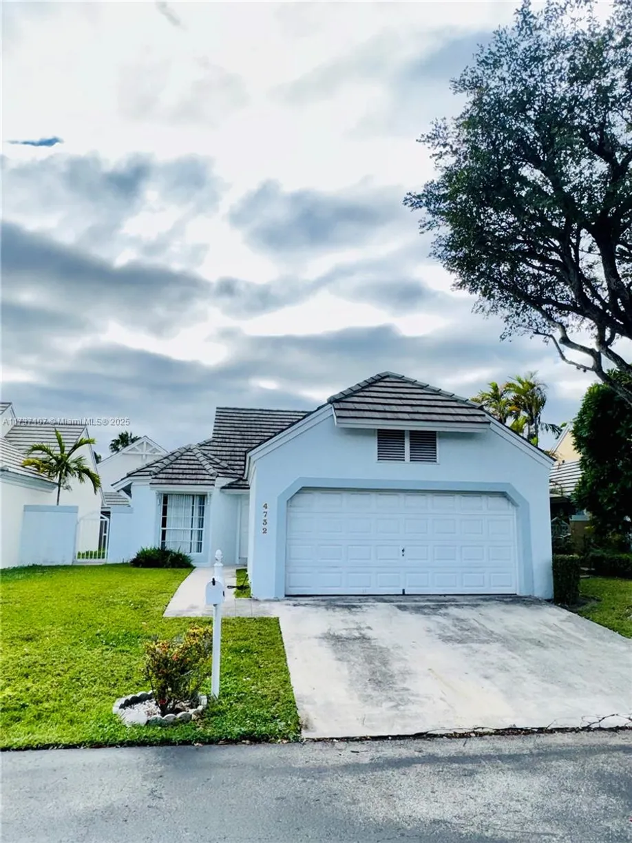 South Florida Real Estate | View 4732 NW 98th Pl | 3 Beds, 2 Baths