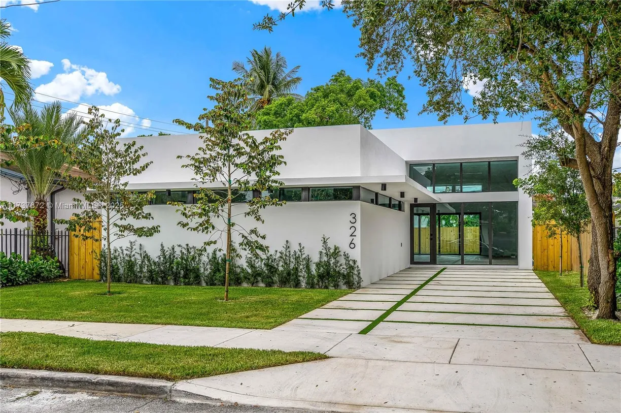 South Florida Real Estate | View 326 NW 40th St | 3 Beds, 2 Baths