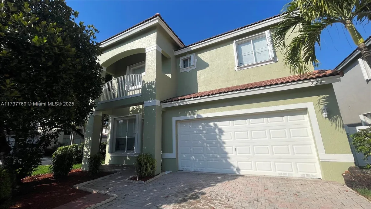 South Florida Real Estate | View 7743 NW 21st Dr | 4 Beds, 3 Baths