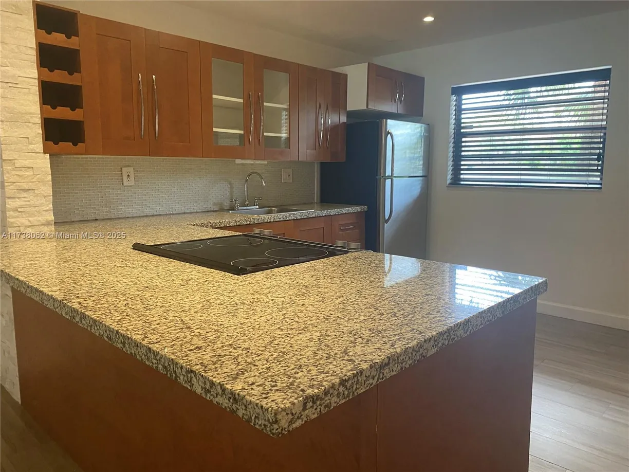 South Florida Real Estate | View 6090 N Sabal Palm Blvd, 208 | Listing