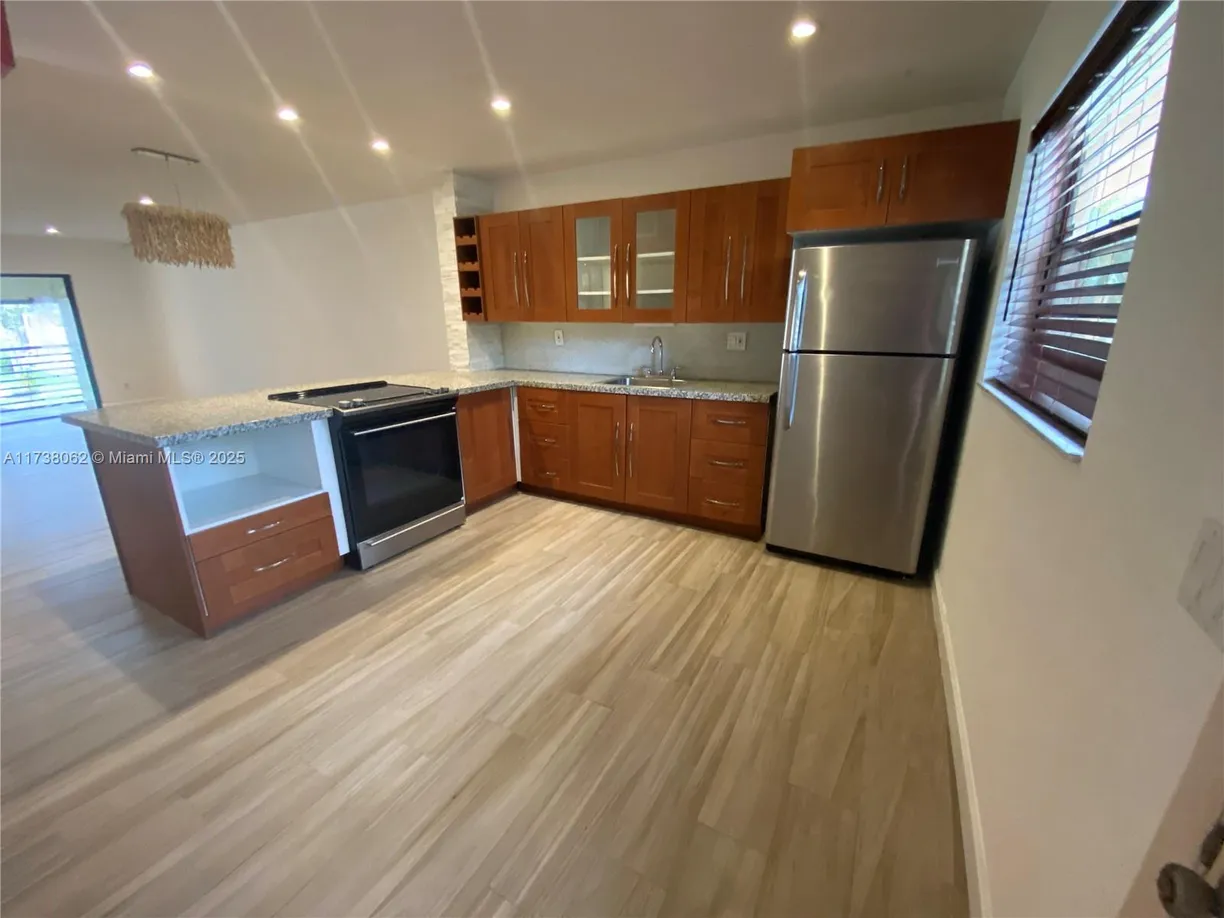 South Florida Real Estate | View 6090 N Sabal Palm Blvd, 208 | Listing