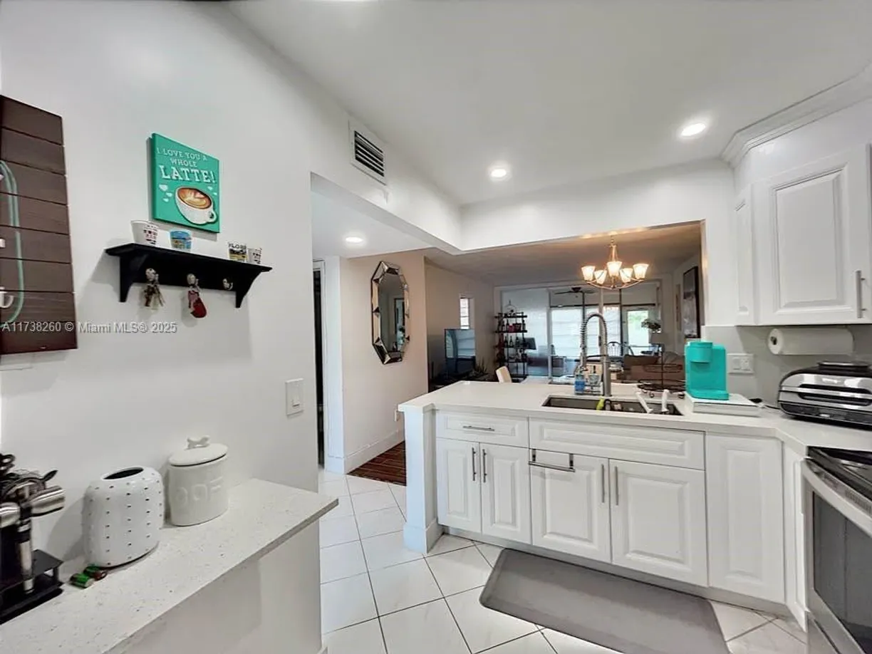 South Florida Real Estate | View 5890 NW 64th Ave, 110 | 2 Beds, 2 Baths