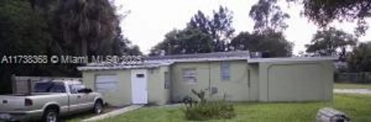 South Florida Real Estate | View 700 SW 8th St | 2 Beds, 2 Baths