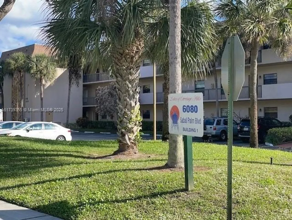 South Florida Real Estate | View 6080 N Sabal Palm Blvd, 103 | 2 Beds, 2 Baths