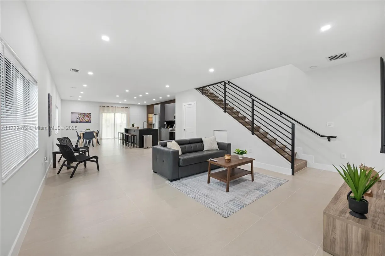 South Florida Real Estate | View 1121 NW 25th St | 4 Beds, 2 Baths