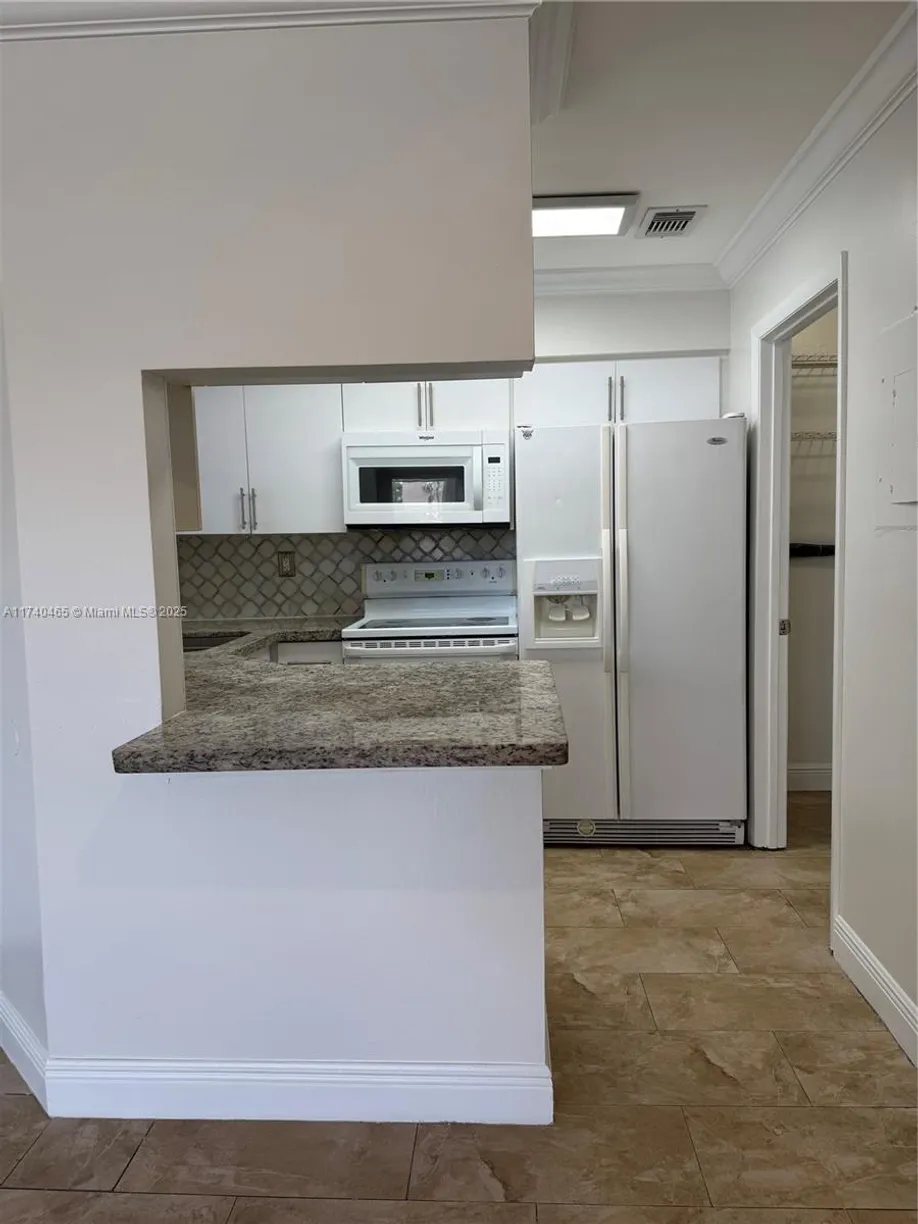 South Florida Real Estate | View 17330 NW 67th Pl, L-6 | Listing