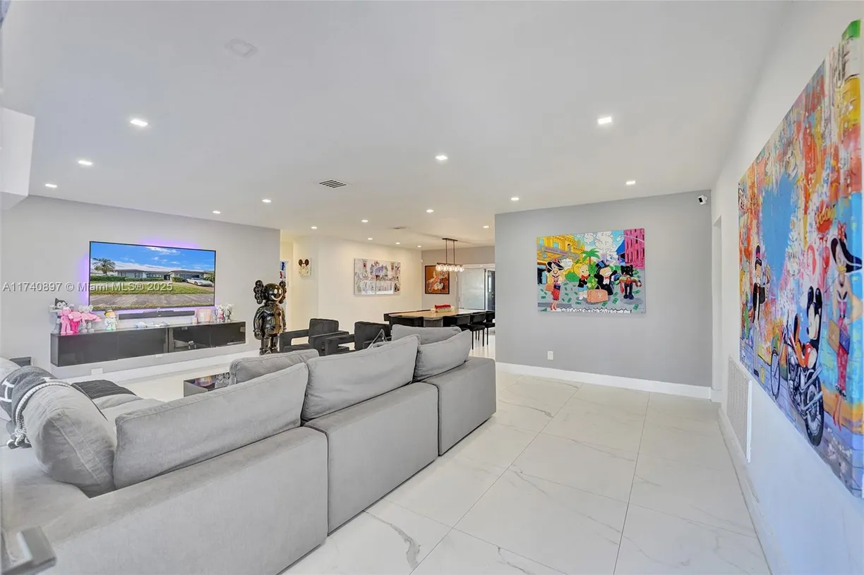 South Florida Real Estate | View 3630 N 55th Ave | 4 Beds, 3 Baths