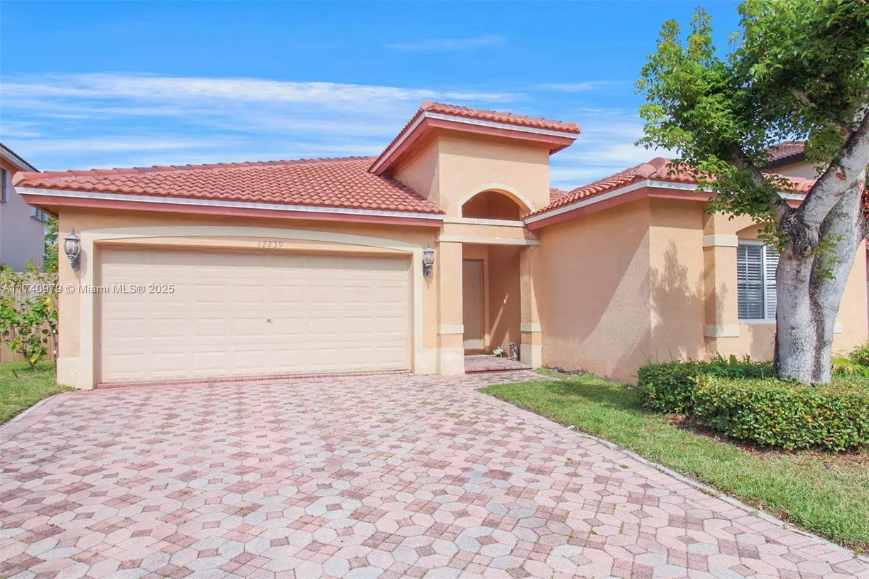 South Florida Real Estate | View 12239 SW 140th St | 3 Beds, 2 Baths