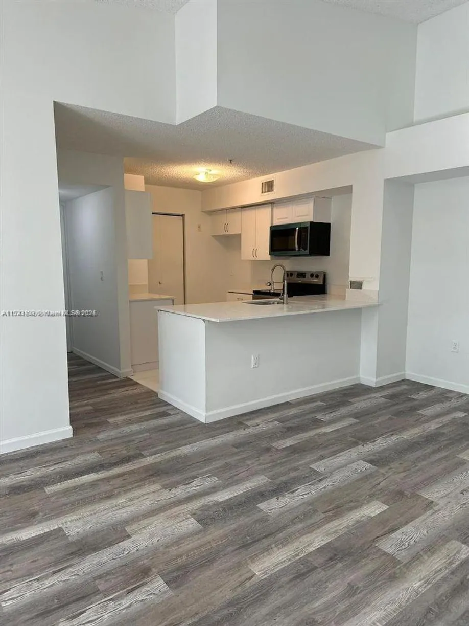 South Florida Real Estate | View 2123 Renaissance Blvd, 305 | 3 Beds, 2 Baths