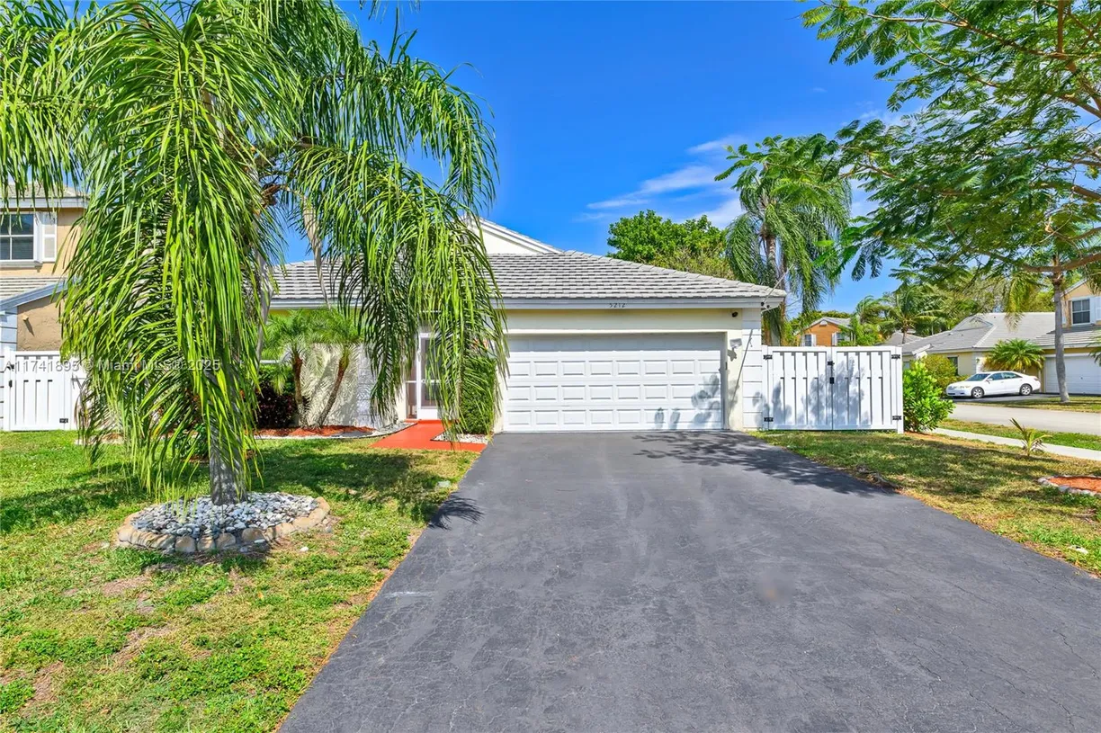 South Florida Real Estate | View 5212 NW 53rd Cir | 3 Beds, 2 Baths