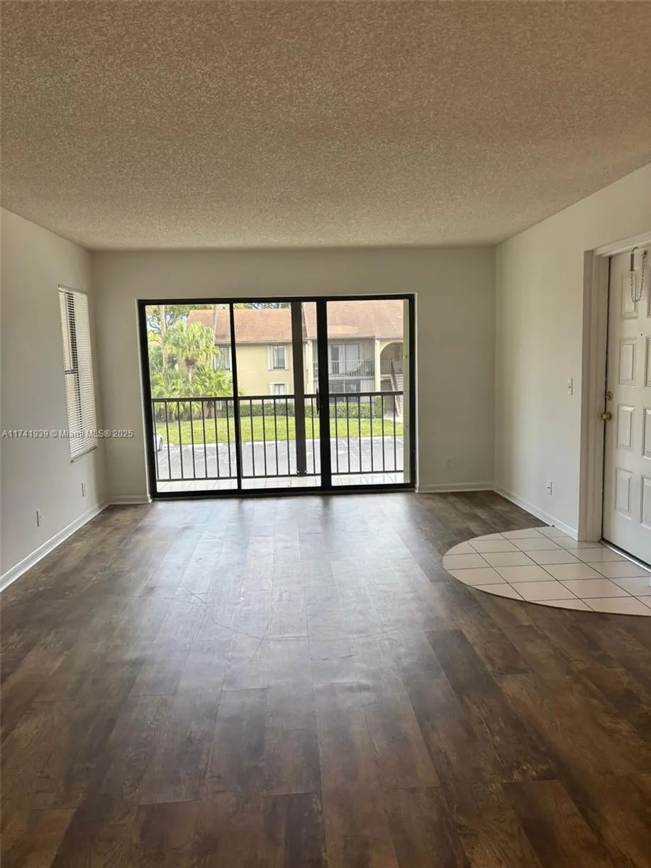 South Florida Real Estate | View 718 Sunny Pine Way, H2 | Listing
